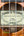 Kanile’a Hawaiian Islands Tenor Ukulele label seen through the sound hole, Premium Koa Wood