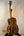 Acoustic guitar with rich brown wood grain, showcasing Kanile’a Hawaiian Islands Premium Koa Wood