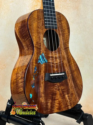 Beautiful Kanile’a Hawaiian Islands Tenor Ukulele with premium koa wood and turquoise inlay