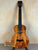 Beautiful Kanile’a Hawaiian Premium Tenor Ukulele with Curly Koa body and black fretboard