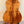 Acoustic guitar featuring the Kanile’a Hawaiian Premium Tenor Ukulele Curly Koa back panel