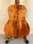 Acoustic guitar featuring the Kanile’a Hawaiian Premium Tenor Ukulele Curly Koa back panel