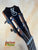 Black guitar headstock with silver tuning pegs on Kanile’a Hawaiian Premium Tenor Ukulele