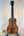 Wooden Kanile’a HNS-T-PREM Concert Ukulele with floral inlays and padded gig bag