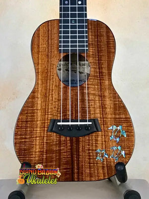 Beautiful Kanile’a HNS-T-PREM Concert Ukulele with curly koa and butterfly inlays