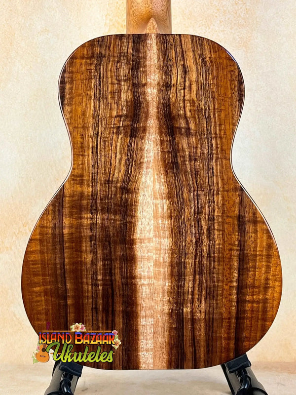 Acoustic guitar with striking striped koa back panel in Kanile’a HNS-T-PREM Tenor Ukulele