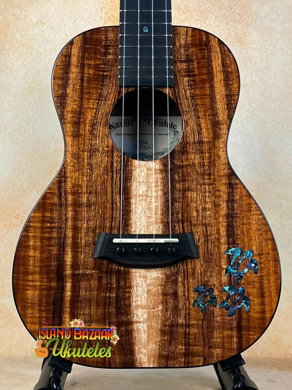 Beautiful Koa wood Kanile’a HNS-T-PREM Tenor Ukulele with blue floral inlay