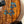 Kanile’a HNS-T-PREM Tenor Ukulele with blue turtle inlays and premium curly koa wood