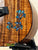 Kanile’a HNS-T-PREM Tenor Ukulele with blue turtle inlays and premium curly koa wood