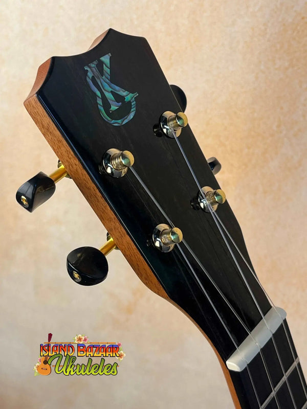 Guitar headstock with tuning pegs featuring Kanile’a HNS-T-PREM Tenor logo design