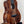 Beautiful Koa wood Kanile’a Honus Tenor Ukulele with dark grain and black hardware