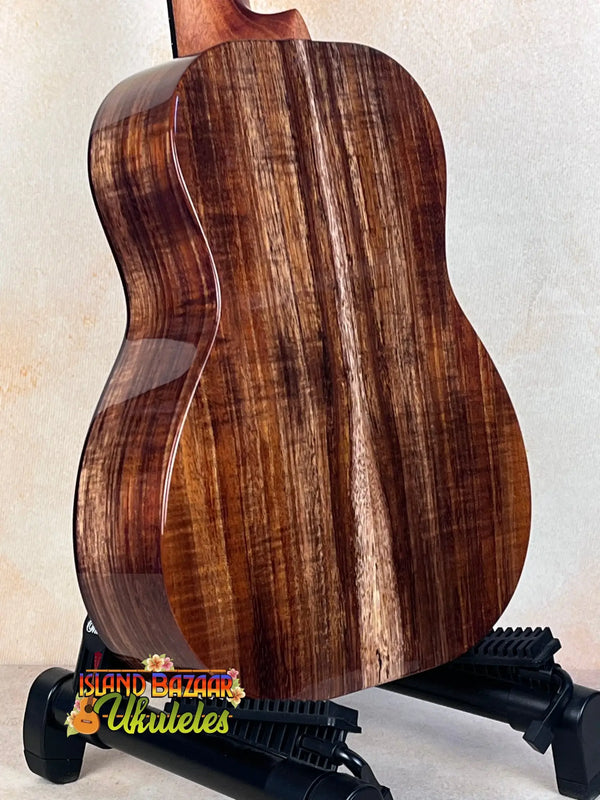 Beautiful Kanile’a Honus Tenor Ukulele with rich brown striped koa wood back and sides