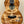 Beautiful Kanileʻa Honus Tenor Ukulele with dolphin design and koa wood finish