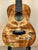 Beautiful Kanileʻa Honus Tenor Ukulele with dolphin design and koa wood finish