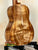 Kanileʻa Honus Tenor ukulele showcasing beautiful koa wood grain patterns