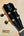Guitar headstock with black finish and gold tuning pegs for Kanileʻa Honus Tenor Ukulele