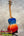 Kanilea Ilikai T Pro tenor ukulele in vibrant blue-to-red gradient maple