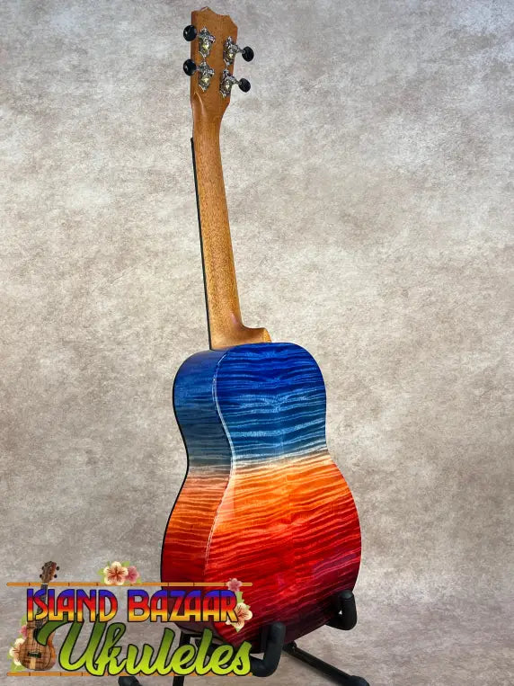 Kanilea Ilikai T Pro tenor ukulele in vibrant blue-to-red gradient maple