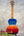 Vibrant ʻilikai t pro tenor ukulele with blue-to-orange-to-red gradient