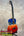 Kanile’a Ilikai T Pro tenor ukulele with vibrant blue-to-orange flame maple finish