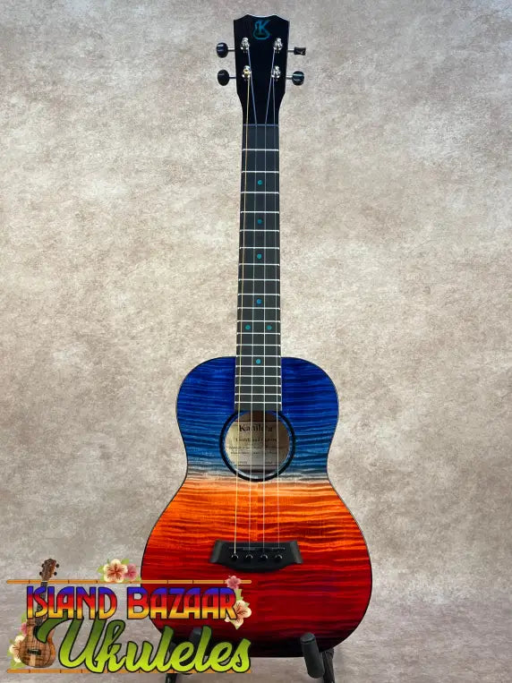 Kanilea Ilikai T Pro tenor ukulele in vibrant blue-to-orange flame maple