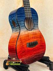 Colorful Kanileʻa ’Ilikai Tenor Ukulele on stand, perfect for Island Bazaar enthusiasts