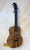 Beautiful Hawaiian Koa Kanile’a K-1 Deluxe Tenor Ukulele with black tuning pegs