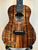 Kanile’a K-1 Deluxe Tenor Ukulele showcasing beautiful koa wood with striking grain patterns