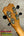Back of Kanileʻa K-1 Soprano ukulele headstock with tuning pegs in premium Hawaiian koa