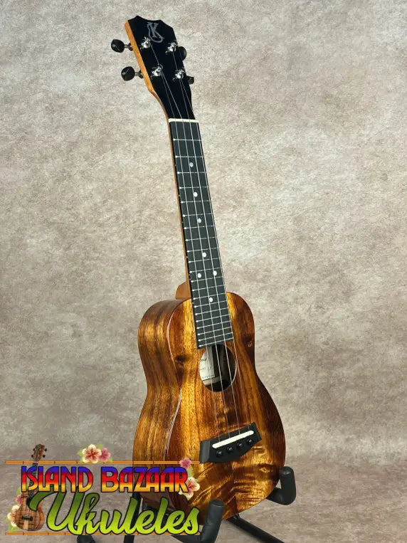 Glossy dark wood Kanileʻa K-1 Soprano Ukulele with tru-r bracing and premium Hawaiian koa