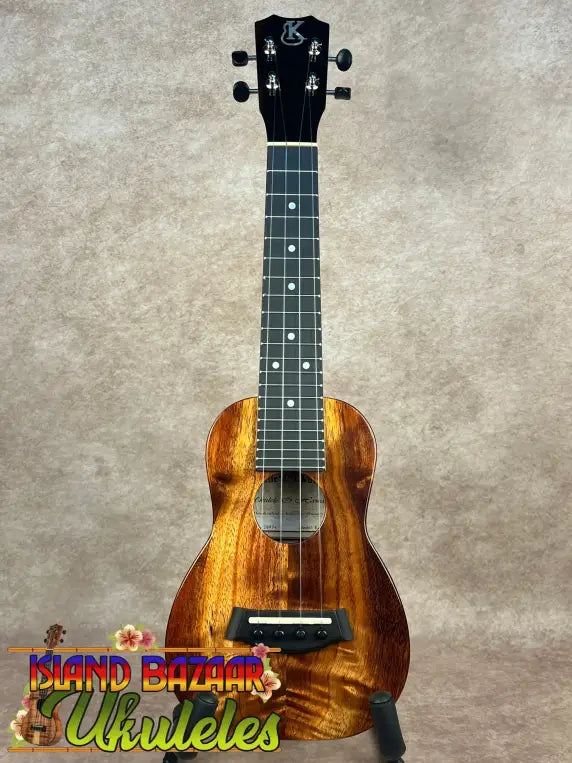 Brown wooden Kanileʻa K-1 Soprano Ukulele with Tru-R Bracing in premium Hawaiian Koa