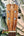 Wooden ukulele headstock with K logo and tuning pegs on Kanile’a K-1 Tenor at Island Bazaar