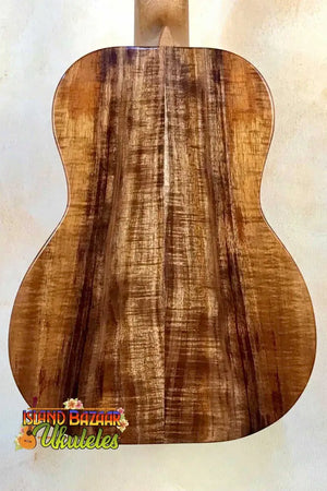 Kanile’a K-1 Tenor with premium grain koa back and elegant ebony fretboard