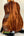 Acoustic guitar with rich brown wood grain in Kanile’a K-2 Deluxe Concert Ukulele