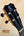 Guitar headstock with silver tuning pegs on Kanile’a K-2 Deluxe Concert Ukulele