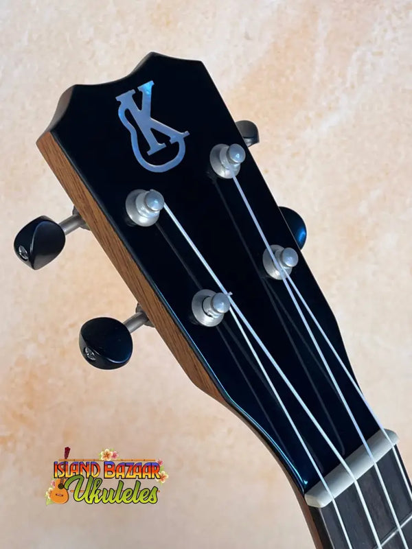 Guitar headstock with silver tuning pegs on Kanilea K-2 Premium Tenor Ukulele Koa Body