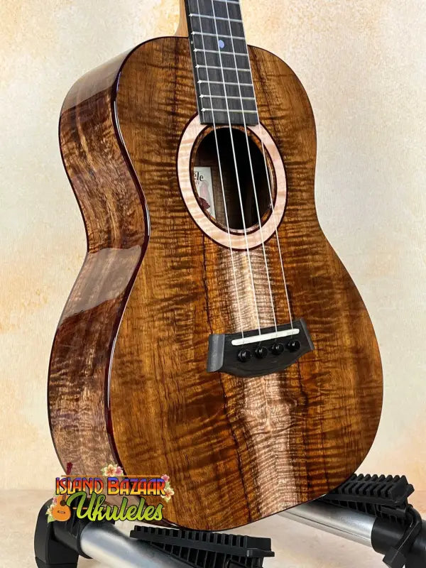 Kanile’a K-3 Tenor Ukulele with Master Grade Curly Koa and unique grain patterns