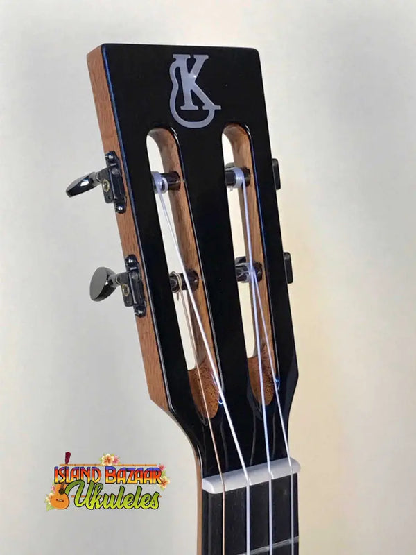 Guitar headstock with KC logo and tuning pegs from Kanilea K-3T Tenor Deluxe Koa