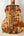 Acoustic guitar back panel of Kanilea K-3T Tenor showcasing deluxe koa with stunning grain