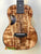 Beautiful Kanilea K-3T Tenor Ukulele with deluxe koa wood and D-shaped sound hole