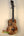 Beautiful Kanilea K-3T Tenor Ukulele Deluxe Koa showcasing unique grain and D-shaped sound hole