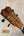 Wooden ukulele headstock with tuning pegs on Kanilea K1 Tenor Ukulele in Hawaiian Curly Premium Koa