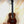 Wooden Kanilea K3-T Tenor Koa Ukulele with dark brown finish and maple rosette