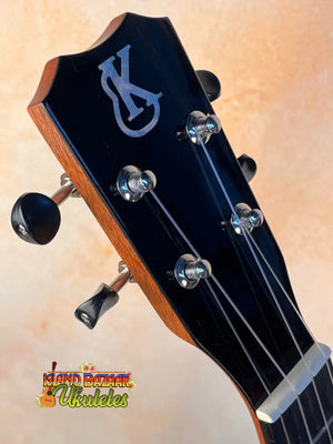 Guitar headstock with K logo and chrome tuning machines on Kanile’a K3-T Tenor Koa Ukulele