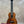 Kanileʻa koa core concert ukulele with rich warm-toned wood finish and intricate grain patterns in deluxe gig bag