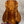 A kanileʻa honus tenor ukulele crafted from mahogany with a warm finish and intricate wood grain patterns with deluxe gig bag