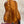 Kanileʻa koa core concert ukulele with deluxe gig bag in glossy amber wood featuring rich grain and elegant curves