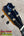 Black kanileʻa honus tenor ukulele headstock with blue white logo gold tuning pegs and black knobs