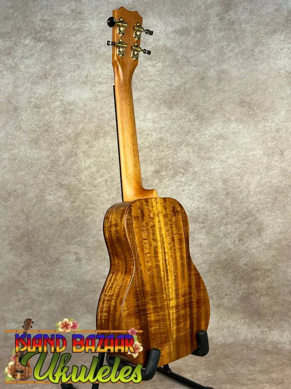Hawaiian koa Kanileʻa KPA-C Master Concert Ukulele with vibrant grain and gold tuning pegs