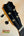 Guitar headstock of Kanilea KPA-C Master Concert Ukulele in black with gold tuning pegs